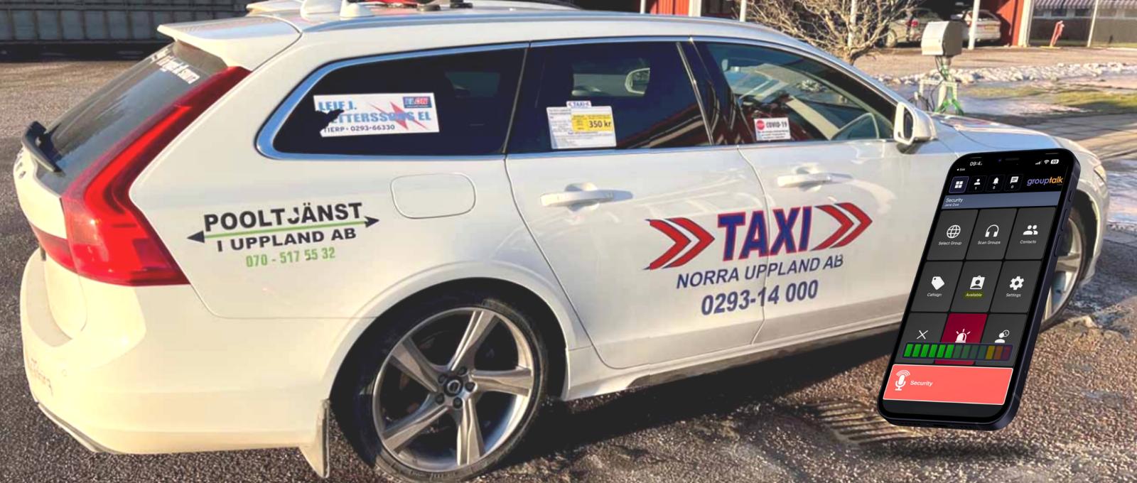 Taxibil med Taxi Norra Uppland logga men iphone och grouptalk appen med funktionen överfallslarm 