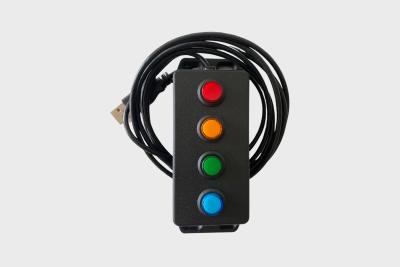 USB-tillbehör med fyra Push to Talk-knappar för dispatchers.